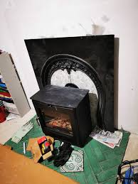 Cast iron fireplace surrounds for sale near me