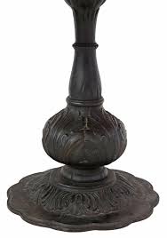 Sold at Auction: LARGE OAK & CAST IRON PEDESTAL DINING TABLE WITH LAZY SUSAN