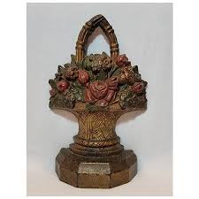 Cast iron flower basket doorstop in original paint. For Sale at Ruby Lane