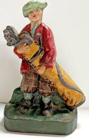 CAST IRON GOLF CADDY DOORSTOP - RARE | eBay