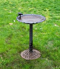 Sold at Auction: Cast Iron Bird Bath