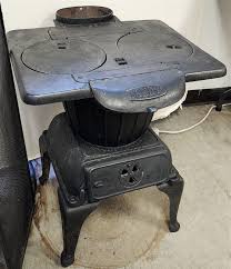 DANDY CAST IRON STOVE 24"H X 20"W X 22"D sold at auction on ...
