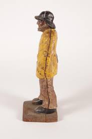 Sold at Auction: Antique Polychromed Cast Iron Old Salt Doorstop