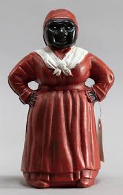 Lot - Reproduction cast iron Aunt Jemima Bank, height 11 inches