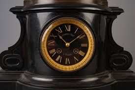 A three-piece black marble clock garniture with on top Pan with a young maiden, France, 19th C. - Coronari Auctions