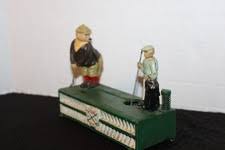 Cast Iron Bank Golfer | eBay