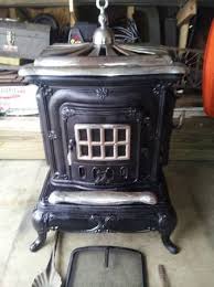 Antique parlor stove -- not EPA emission certified, but man ...