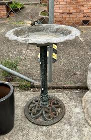 Sold at Auction: Aluminium and cast iron garden bird bath on ...