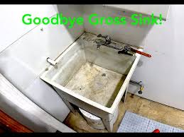 Replacing our nasty garage sink with a new stainless ...