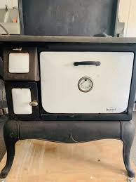 Wood-burning cook stove with side shelves! 6in flu pipe 41†wide 58†tall Works -- Antique Price Guide Details Page