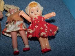 LOT 54 FOUR WONDERFUL VINTAGE CELLULOID DOLLS | EstateSales.org