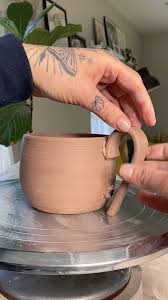 How I attach mug handles #mugs #handmademugs #ceramics #pottery #potteryprocess #potterytutorial - YouTube