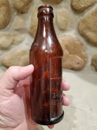 Vintage CERTO amber embossed glass bottle with up-side-down measure 7.25" tall | eBay