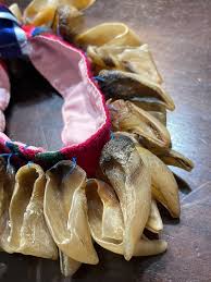 Ankle rattle/noise maker made from horns