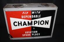 Sold at Auction: CHAMPION AVIATION SPARK PLUGS CABINET SIGN