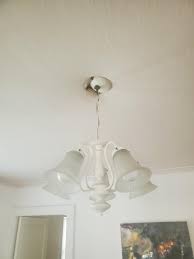 1920s house. Ceiling light fixture seems to be sinking into the ...