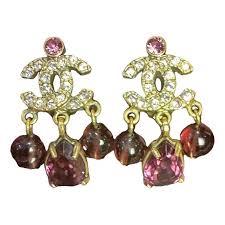 Chanel Earrings: Bow & Charm Detail