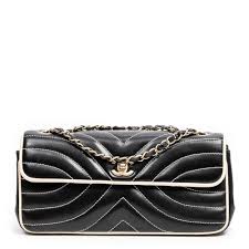 Sold at Auction: A Chanel E/W Wave Stitch Flap Bag