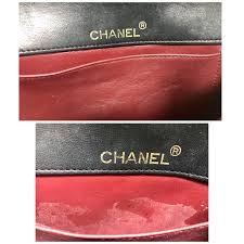 vintage CHANEL black lambskin shoulder bag with golden large CC logo motif. For Sale at 1stDibs | chanel bag big logo, chanel bag with big cc logo, big chanel bag