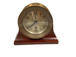 Sold at Auction: Chelsea clock Company, Boston, USA.with stand.7” high Maritime ship clock.