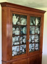 Lot - Antique Sixteen Pane Cherry Corner Cupboard