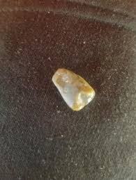 Can someone tell me the name of this stone? Does it have any value? : r/whatsthisrock
