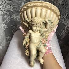 Vintage early 2000s cherub wall hanging Off white... | Depop