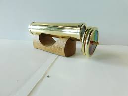 Sold at Auction: Brass Kaleidoscope on Wood Base