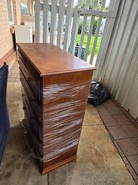Timber tall boy chest of drawers moving sale