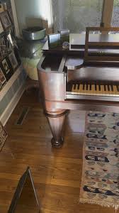 I'm so curious about this antique piano I saw at a client's ...