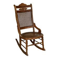 Early 20th Century Victorian Cane Seat Walnut Rocking Chair | Chairish