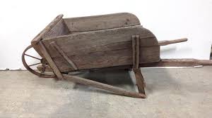 Sold at Auction: Early primitive wheel barrow