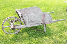 Sold at Auction: Early Wooden Wheelbarrow