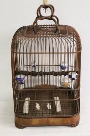 Sold at Auction: Vintage Chinese bird cage with bird feeders