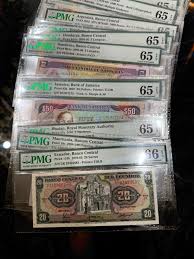 Selling high-grade PMG world banknotes in bulk or individually