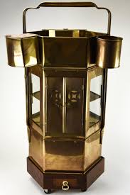 Sold at Auction: Vintage Asian Brass Rolling Tea / Bar Cart