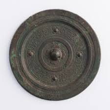 Sold at Auction: A Chinese bronze mirror, Han dynasty