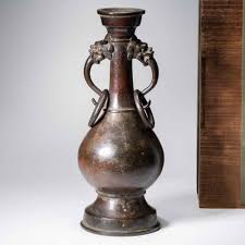 Sold at Auction: A CHINESE BRONZE DRAGON-HANDLED VASE, MING DYNASTY