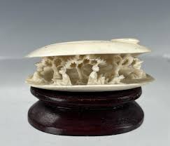 Sold at Auction: Chinese Carved Bone Puzzle Ball and Clam Shell