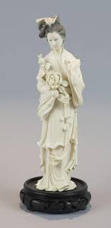 Sold at Auction: Y A Chinese carved ivory figure of a lady, 10 1/2 in. (26.67 cm.) h.