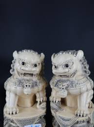 Sold at Auction: Pair of Chinese Carved Ivory Foo Dogs