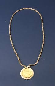 Sold at Auction: 1924 Twenty Dollar Gold Coin on 14kt Gold Chain