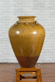 Chinese Antique Martaban Water Jar with Dragon Motifs and Ocher Glaze For Sale at 1stDibs | martaban jar history, ocher jar, antique jar