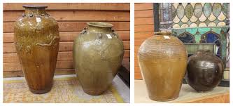 Lot - FOUR CHINESE GLAZED MARTABAN STORAGE JARS