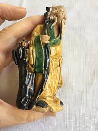 Vintage Shekwan Chinese Mudman Figurine Holding Blue Flute ...