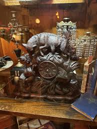 I'm contemplating this hand carved mantle clock but the ...