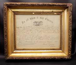 Sold at Auction: 1865 Civil War soldier discharge paper.