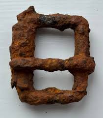 Advice please! I think this is a buckle of some kind and ...