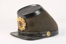 Lot - CIVIL WAR KEPI - Union Soldier''s Parade Kepi with brass badge for the 7th Regiment, artillery buttons on sides