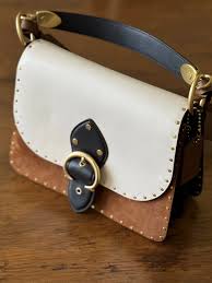 61. Couch Beat Shoulder Bag in Colorblock & Rivets · Whatnot ...